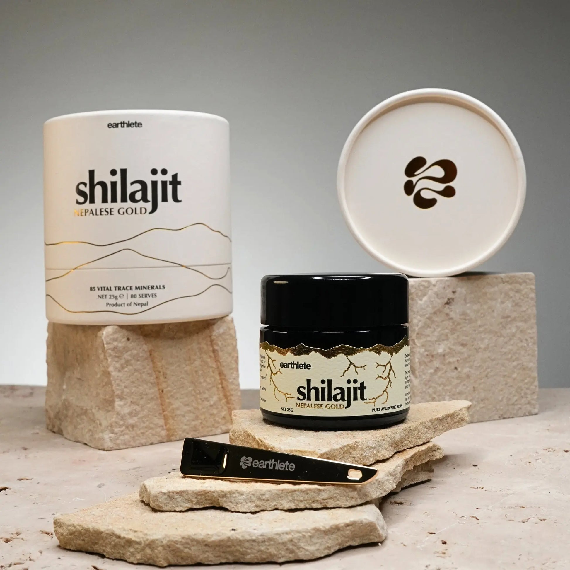 Shilajit product with packaging on a stone surface