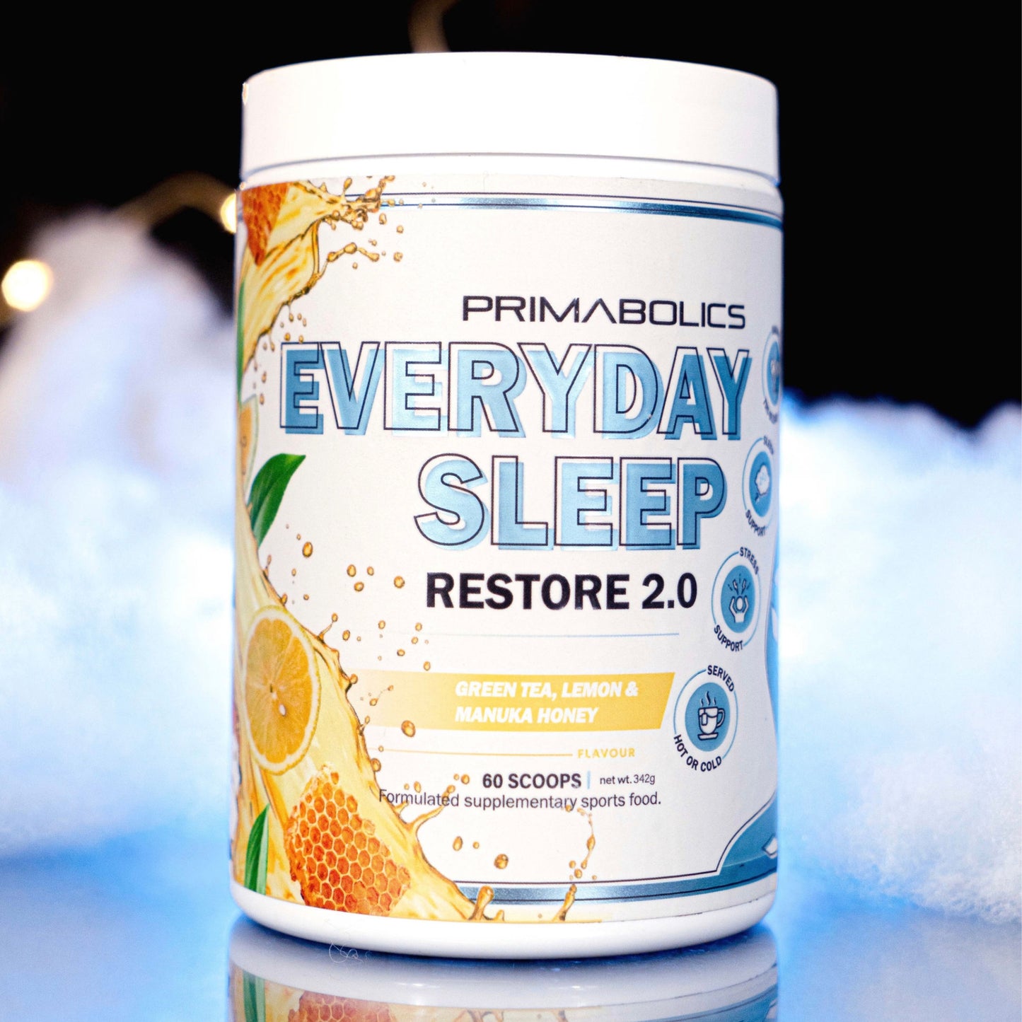 Primabolics Everyday Sleep Restore 2.0 supplement container on a reflective surface with a blurred background