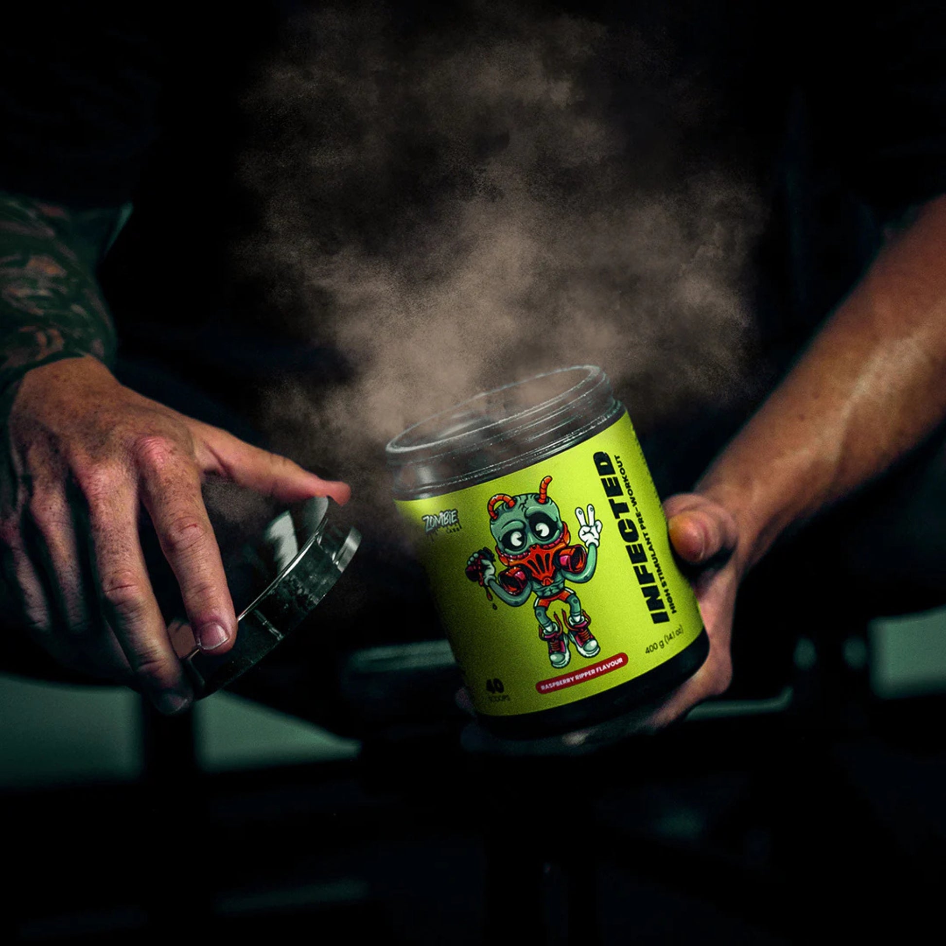 Person holding a container labeled 'Infected' with smoke effect on a dark background